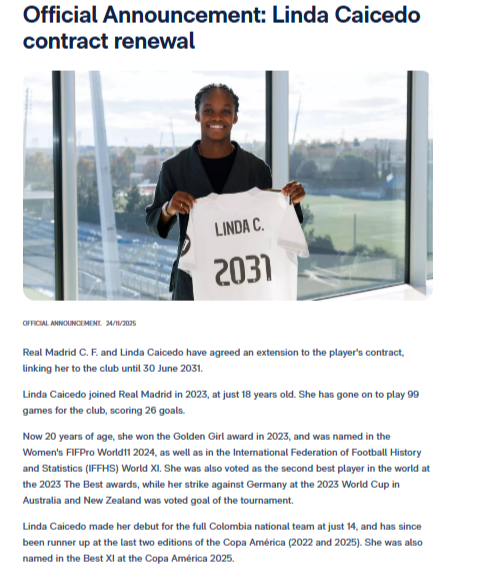 Linda Caicedo holds a Real Madrid jersey with "2023" on it, standing and smiling after signing her contract renewal, as announced in the official club statement.